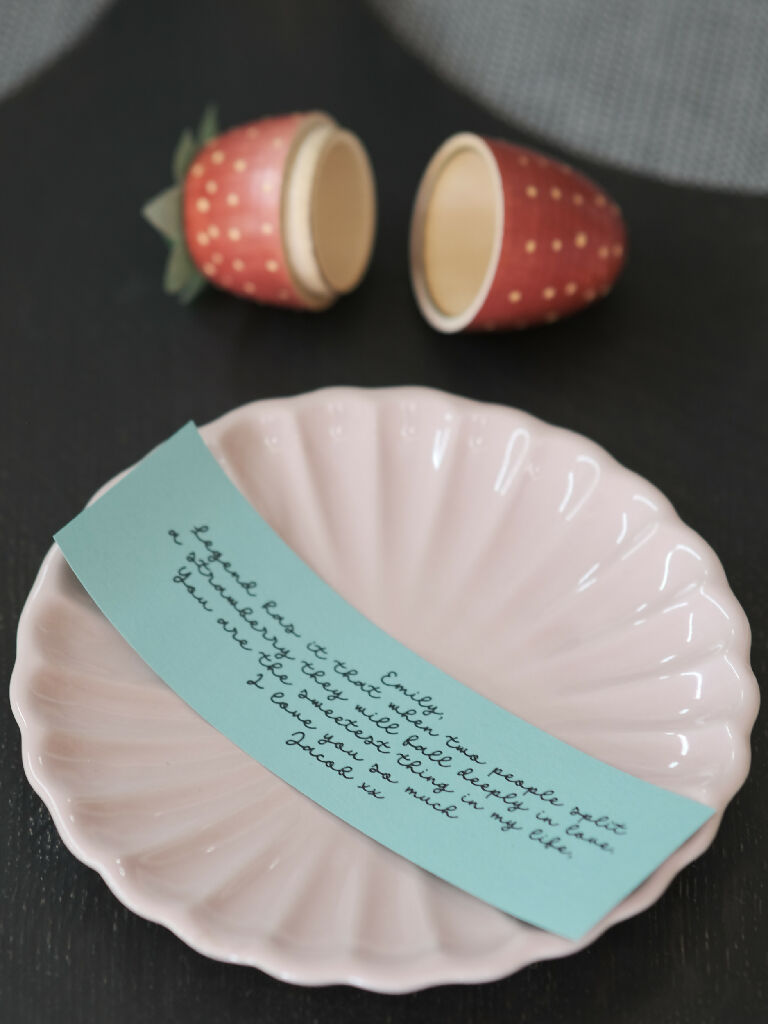 Punnet of hand painted wooden strawberries with a secret message