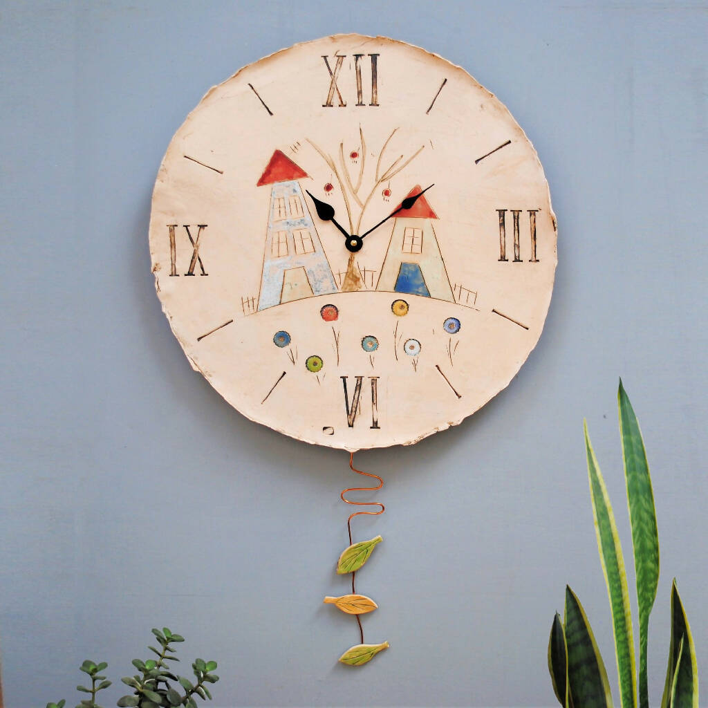 Round Pendulum Wall Clock with Houses | Country Living Marketplace