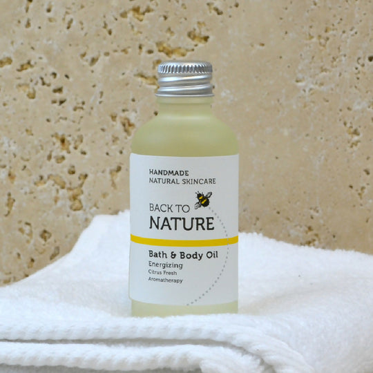 Energizing aromatherapy bath and body oil