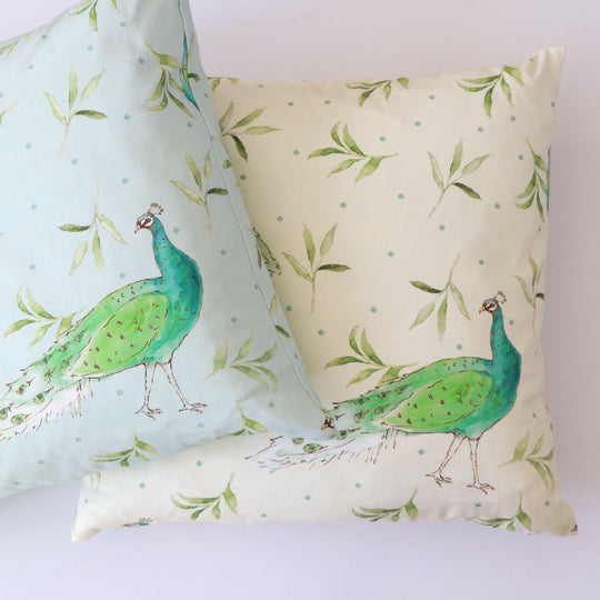 Olive and Dot Peacock Cushion: Antique Cream or Sky Blue