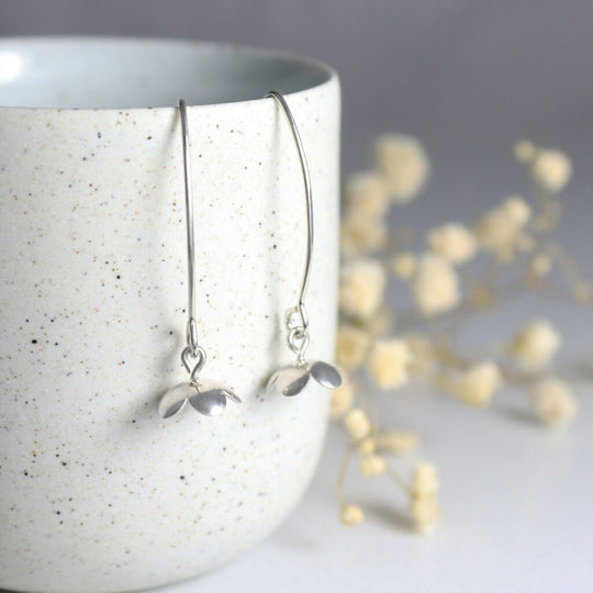 Long silver blossom earrings