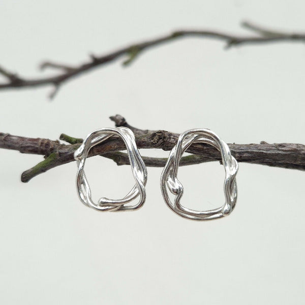 Handcrafted Argentium silver Flow Earrings with fluid wave-inspired swirls
