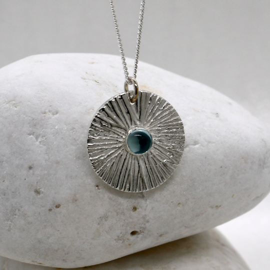 Silver and Sky Blue Topaz Circular Contemporary Necklace