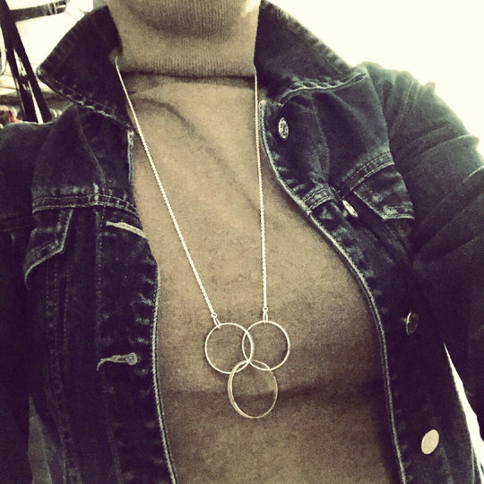 Sterling Silver Necklace with Three Interlocking Hoops on a Long Chain