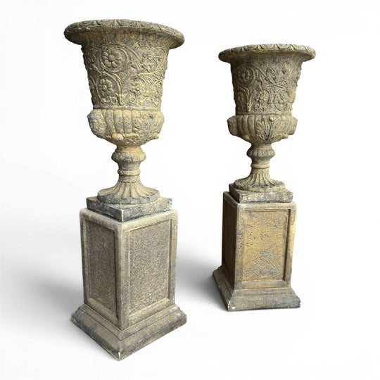 Pair of George III Style Weathered Stone Garden Urns on Pedestals.