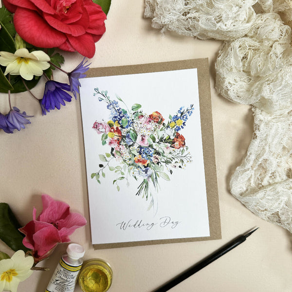 Greeting card with illustration of a modern multi-coloured floral bouquet painted in watercolours with text 'Wedding Day'