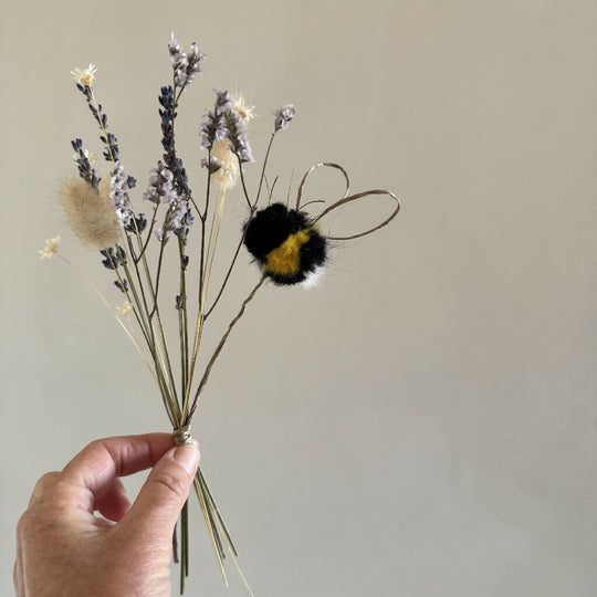Tiny Bunch of Dried Flowers with a Fluffy Bumblebee