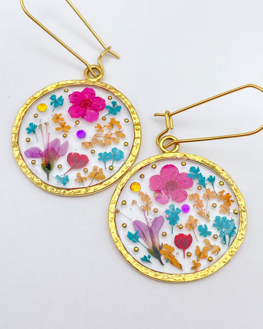 Gold statement earrings with pink flowers