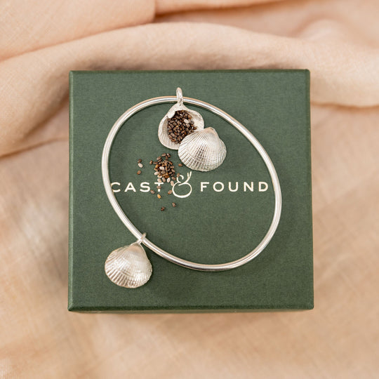 Clam Shell Capsule Memory Bangle