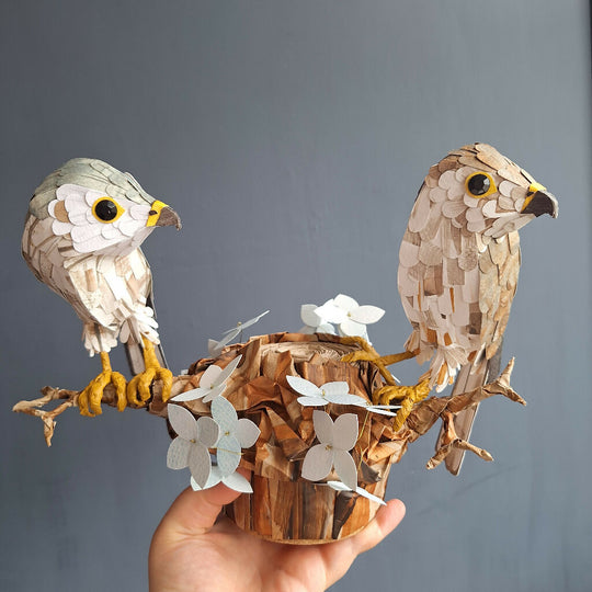 Merlin bird pair on a tree stump handmade paper sculpture