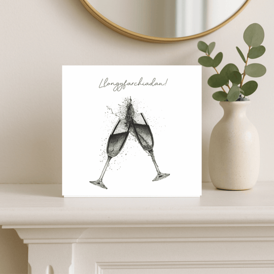 Llongyfarchiadau – Champagne Glasses Greeting Card
