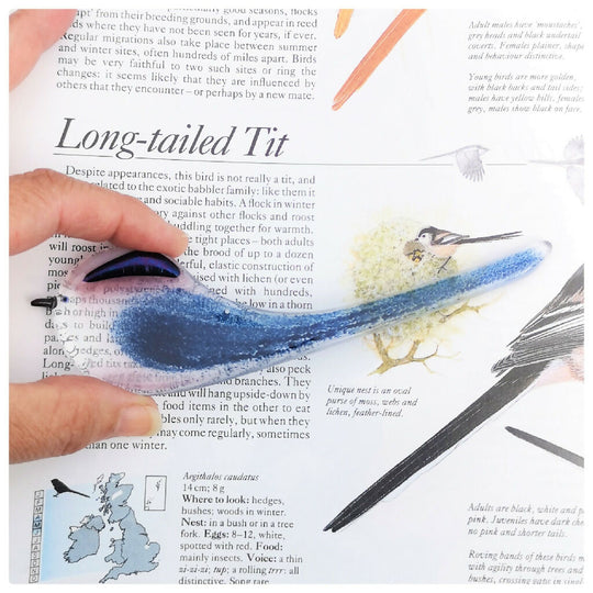 Long tailed-tit, a hanging glass bird decoration