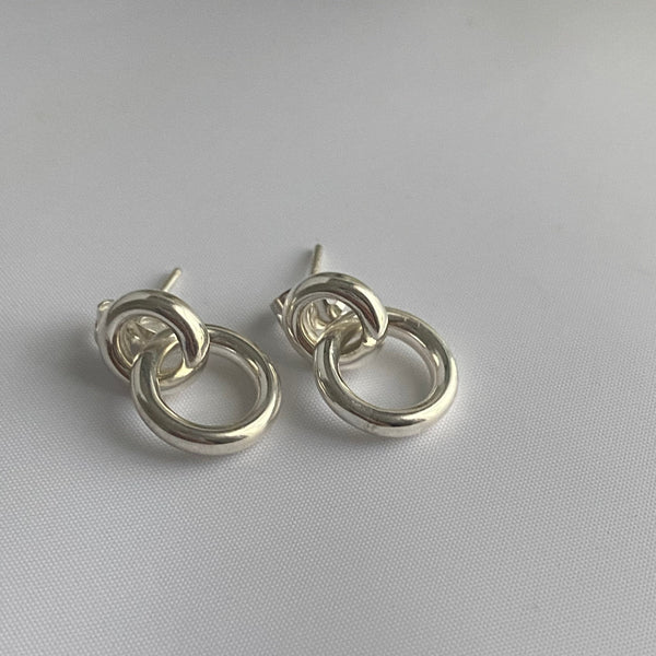 Two Small Interlinked Hoop Sterling Silver Stud Earrings