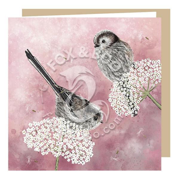 Long tailed tits greeting card by Fox and Boo, pretty card with two birds perched on cow parsley with a dark pink watercolour background.