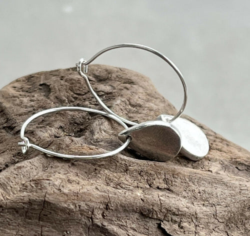 A pair of Silver Devon Raindrop Earrings