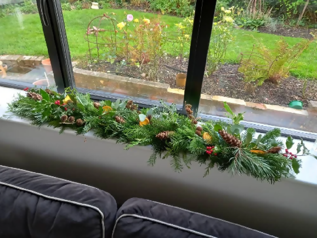 Christmas garland made from Fresh Evergreen Branches & Natural Decorations