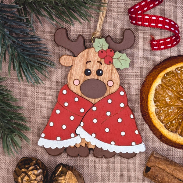 Wooden reindeer in blanket Christmas decoration