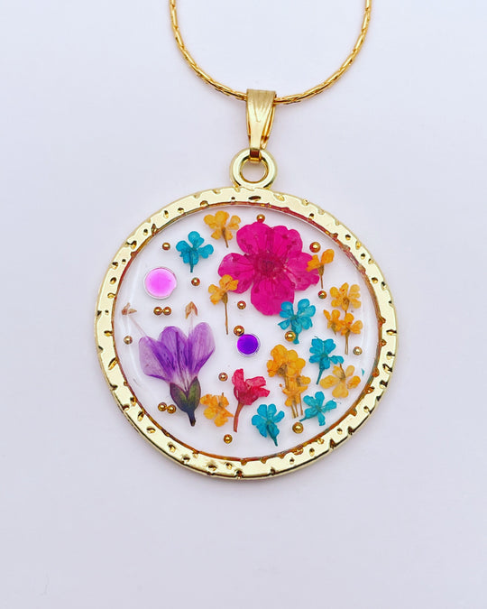 Statement necklace with pink lily flowers in gold