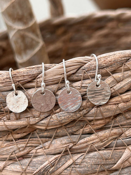 Sea dipping silver dangly earrings