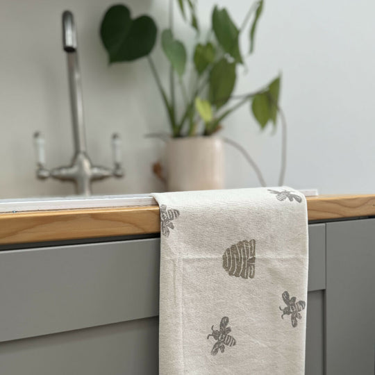 Hand printed bee tea towel