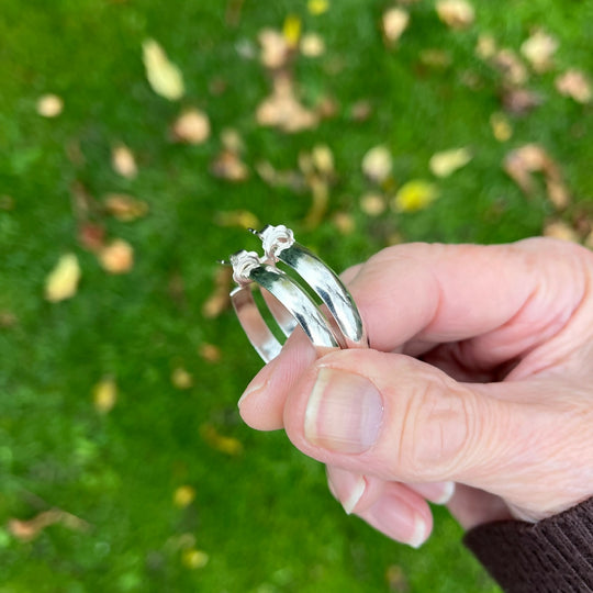 Sterling silver chunky hoop earrings with a polished finish
