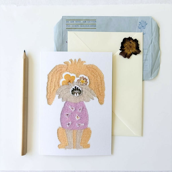 Botanical Cockapoo greetings card featuring artwork originally hand embroidered with silk and alpaca yarn onto pressed flower watercolour paper. Blank inside with an envelope.