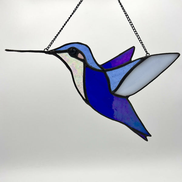 Cobalt blue stained glass hummingbird