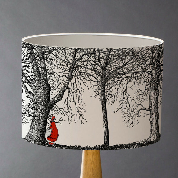 Handmade Red Riding Hood lampshade inspired by the classic fairytale. Featuring woodland scenes, the Big Bad Wolf and iconic red cape.