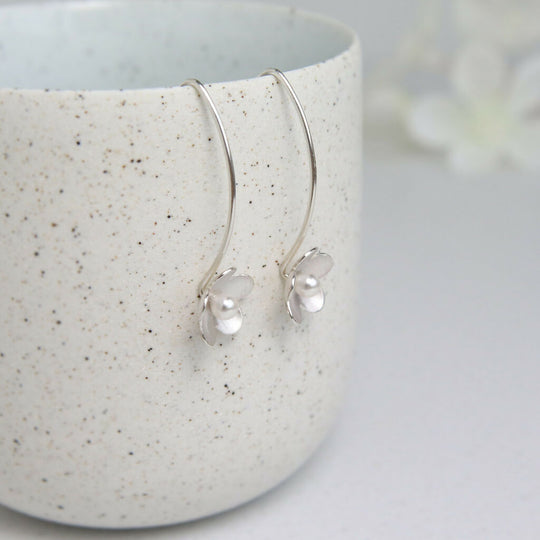 Small silver and pearl blossom long earrings