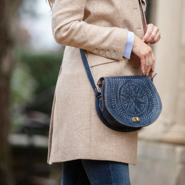 The Temara Embossed Saddle Bag in Navy Blue