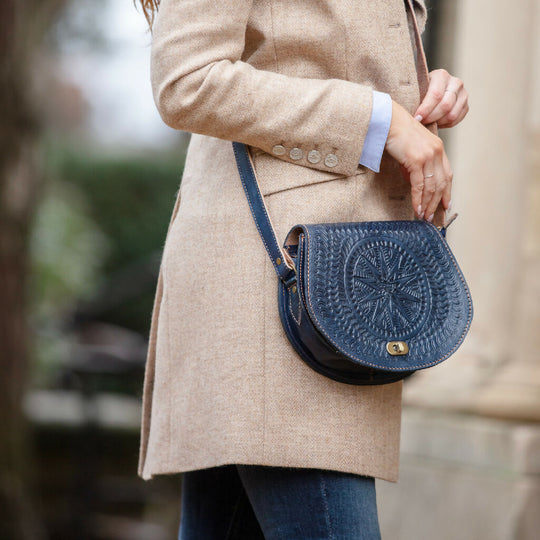 The Temara Embossed Saddle Bag in Navy Blue