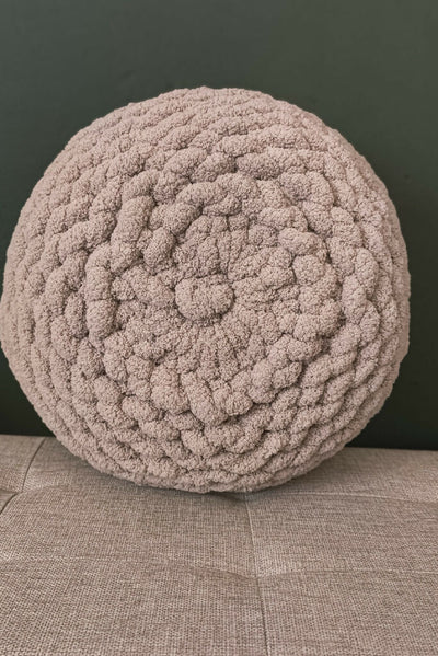 round grey cushion