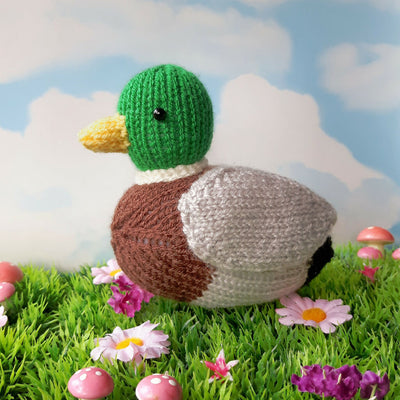 knitted mallard duck on the grass