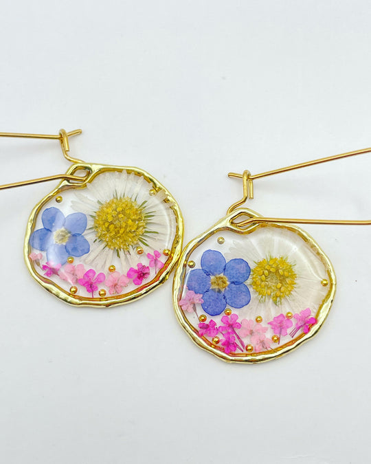 Earrings with daisy and forget me not flowers