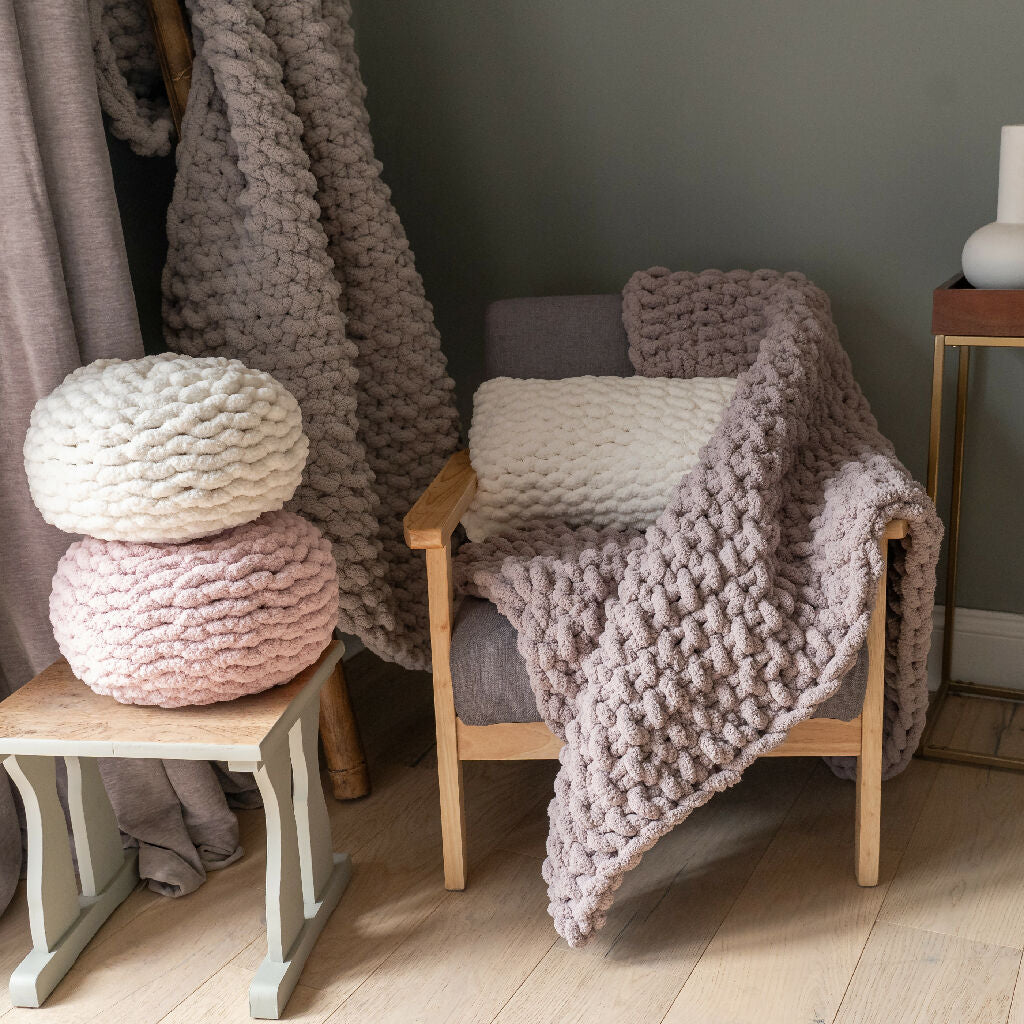 cream & pink round hand-knit cushions