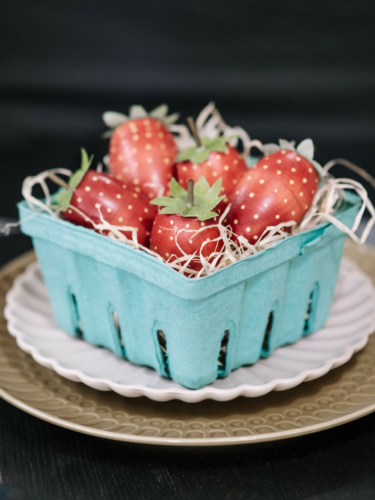 Punnet of hand painted wooden strawberries