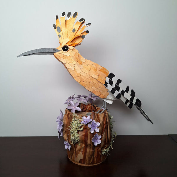 Hoopoe bird perched on a tree stump handmade paper sculpture
