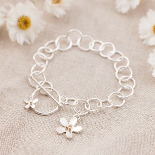 Silver Daisy Charm Bracelet with 9ct Gold Detail