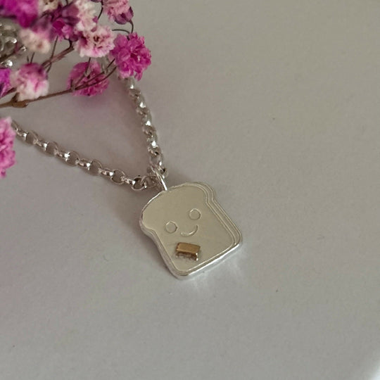 Silver Happy Toast Necklace with a 9ct gold butter