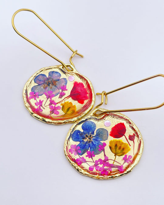 Gold dangle earrings with poppy and blue flowers