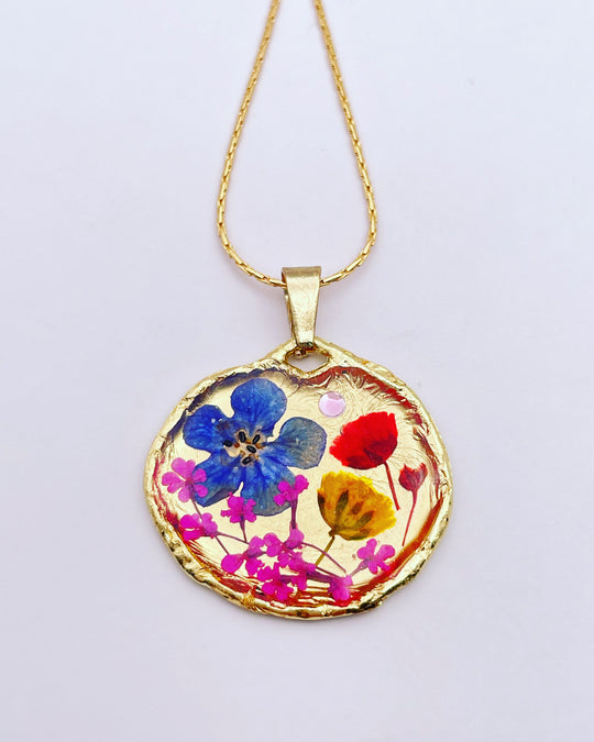Gold necklace with poppy and blue flowers