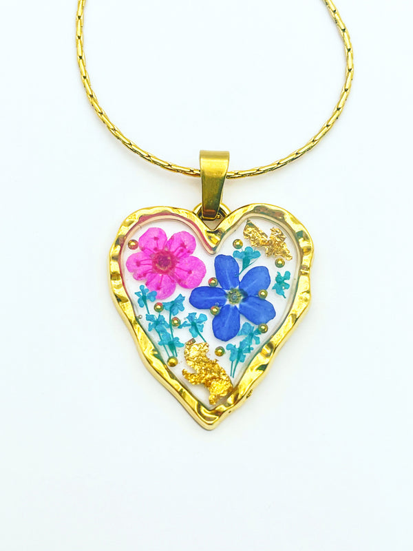 Heart necklace with forget-me-not and pink flowers