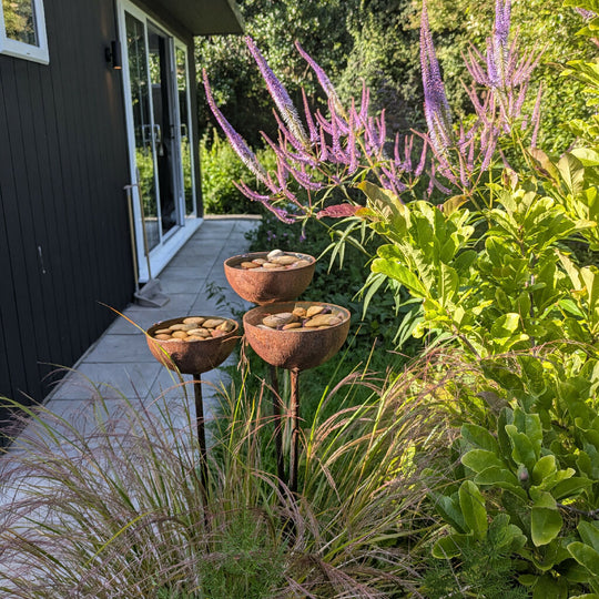 Water Catcher, Wildlife Garden Sculpture, with river pebbles included.
