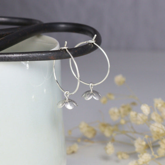 Silver blossom hoop earrings