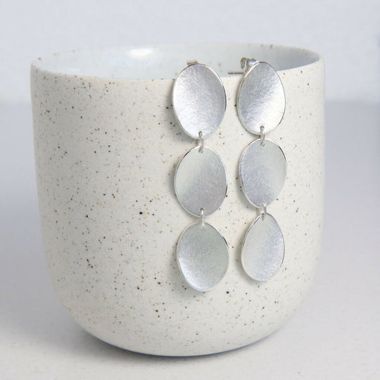 Silver triple petal long earrings