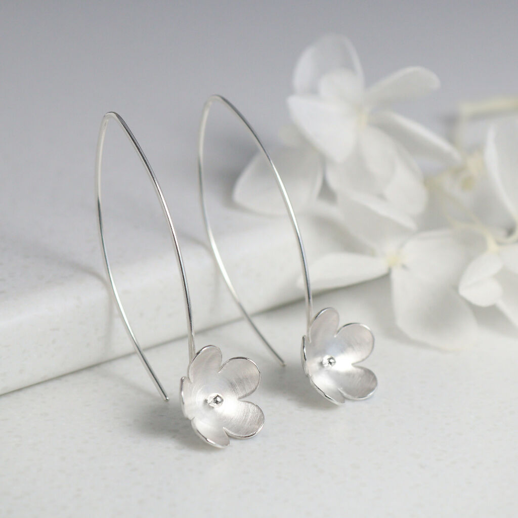 Large silver blossom long earrings