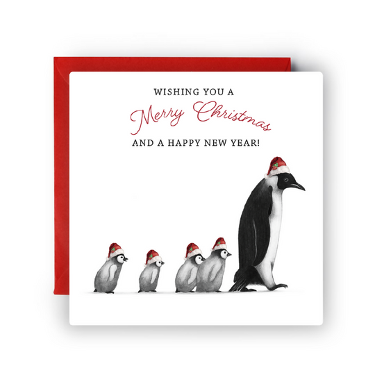Adorable 'Follow Me Penguin' Christmas card with a parent and baby penguins in the snow
