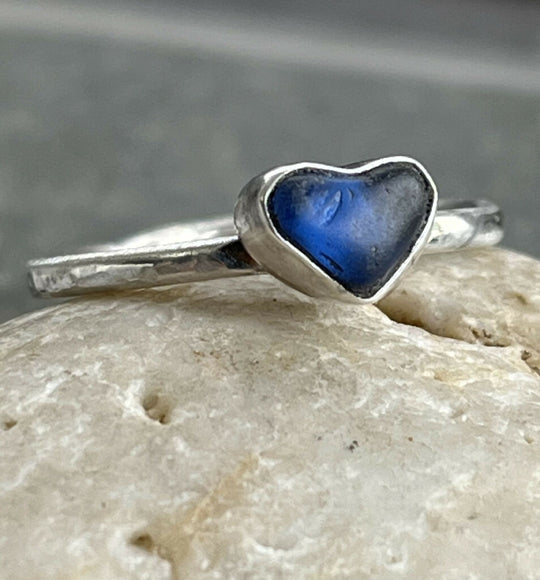A handmade recycled sterling silver and colbat blue heart shaped sea glass ring