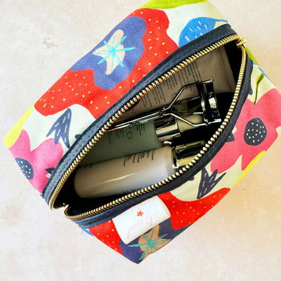 Midsummer-boxy-large-makeup-bag-with-makeup-inside-Jennie-Fynn