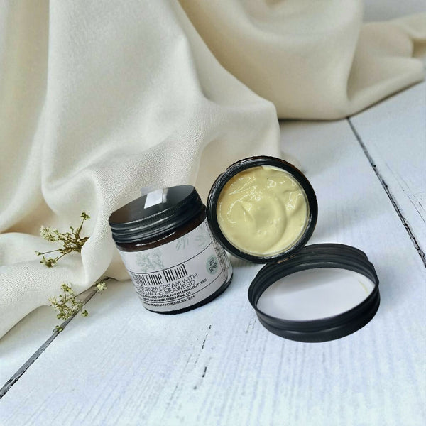 magnesium cream with Irish Moss Seaweed two jars one with the lid off to show consistency made by Buddha and Bubbles Botanicals